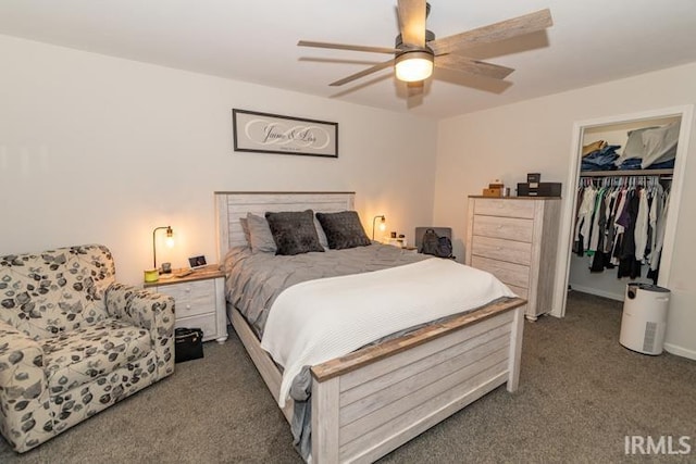 bedroom with carpet floors, a closet, a walk in closet, and ceiling fan