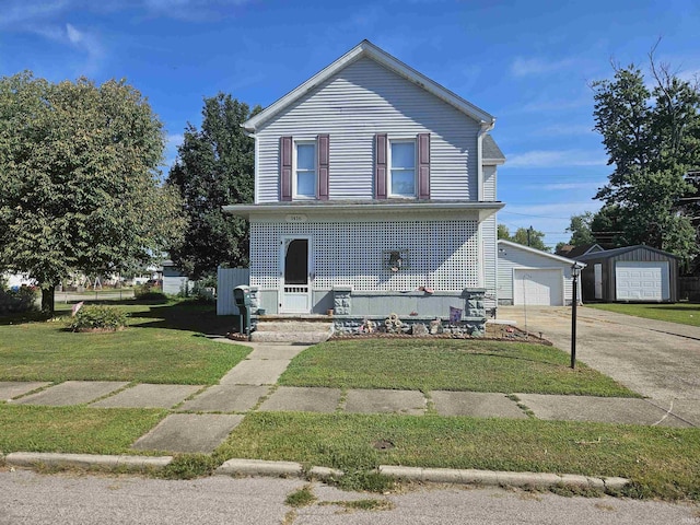 1416 W Walnut St, Washington, IN 47501 - traditional-style house featuring an outdoor structure, a front lawn, and a garage