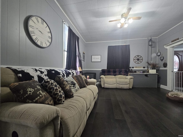 1416 W Walnut St, Washington, IN 47501 - living area with dark wood-type flooring, crown molding, and a ceiling fan