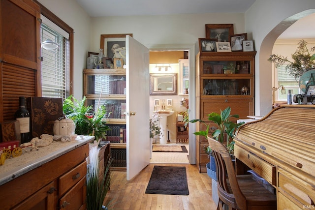 home office featuring light hardwood / wood-style flooring