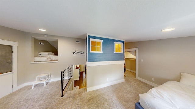 bedroom with light colored carpet