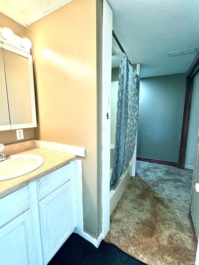 bathroom featuring vanity and walk in shower