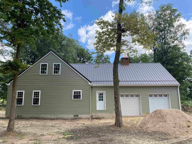 view of home's exterior with a garage