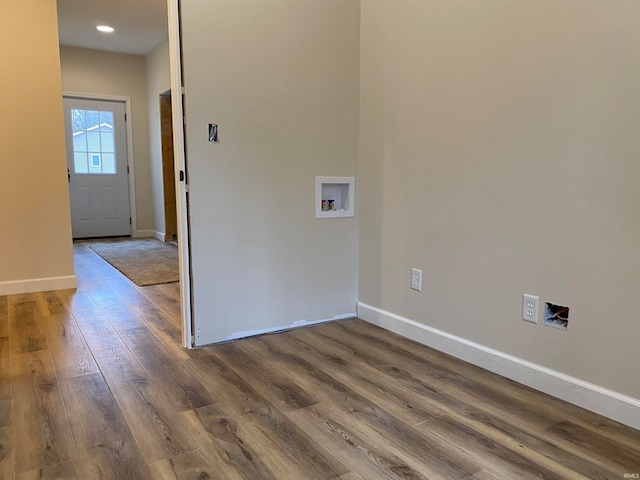 laundry room with hookup for a washing machine and hardwood / wood-style flooring