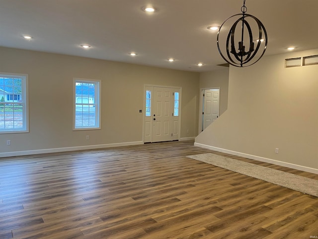 entryway featuring dark hardwood / wood-style flooring and a wealth of natural light