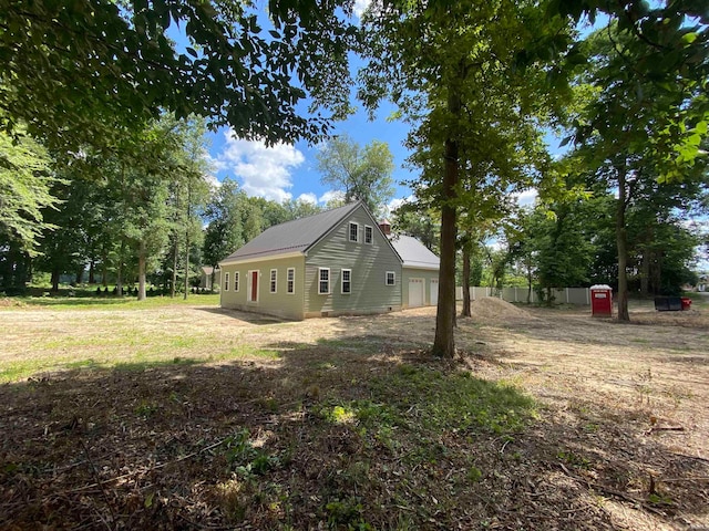 view of home's exterior with a lawn