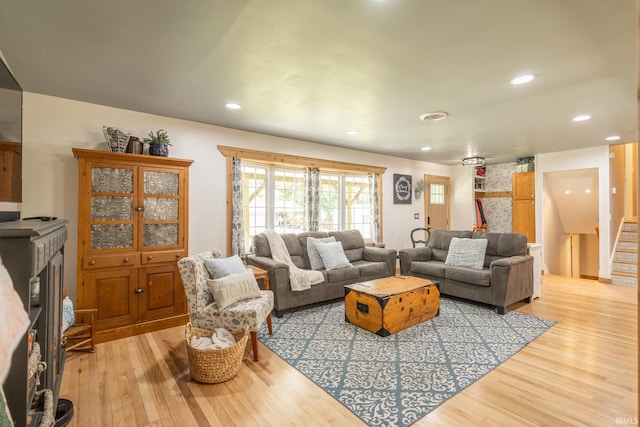 living room with light hardwood / wood-style floors