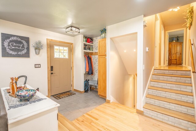 entrance foyer with light tile patterned floors