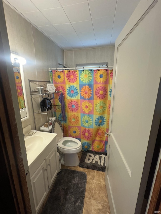 1112 E Fourth St, Mount Vernon, IN 47620 - full bathroom featuring toilet, tile patterned flooring, vanity, and curtained shower