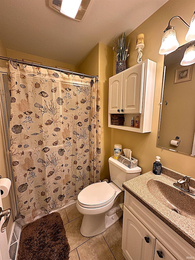 full bath featuring a shower with shower curtain, toilet, tile patterned flooring, and vanity