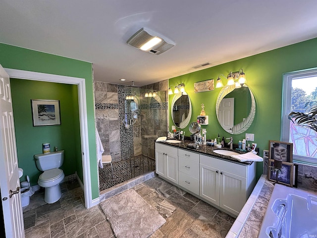 full bathroom featuring tile patterned floors, independent shower and bath, dual vanity, and toilet