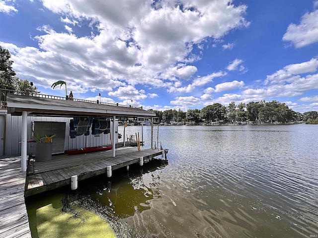 view of dock featuring a water view and boat lift