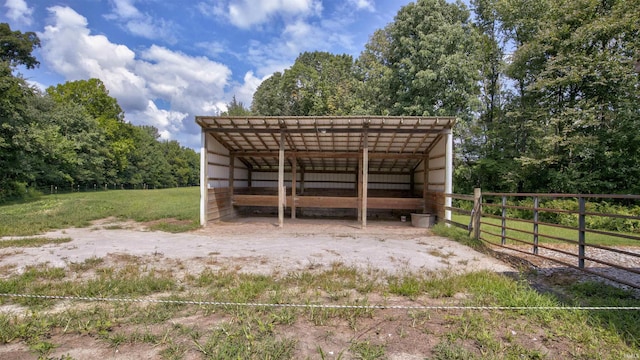 view of outbuilding with an outdoor structure and a detached carport