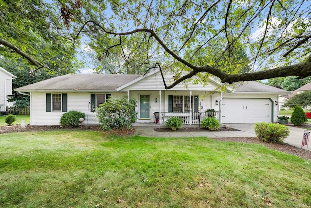 ranch-style house featuring a garage, a front lawn, and a porch