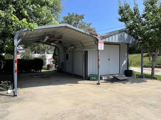 view of vehicle parking featuring a carport