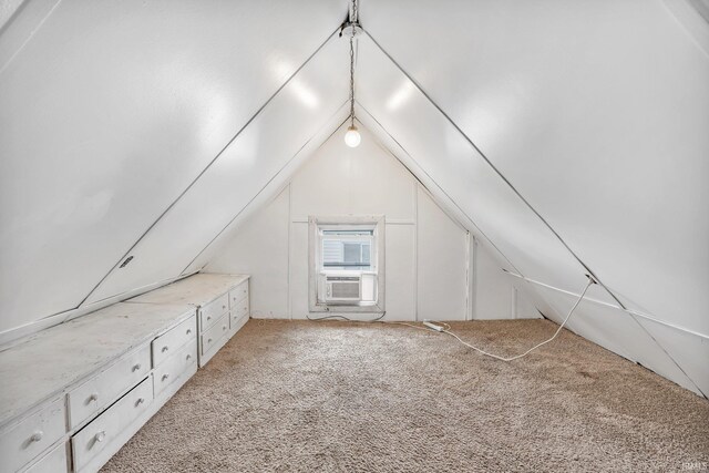 bonus room with carpet floors, vaulted ceiling, and cooling unit