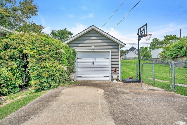 garage featuring a yard