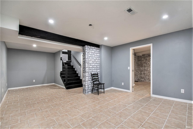 basement featuring light tile patterned flooring