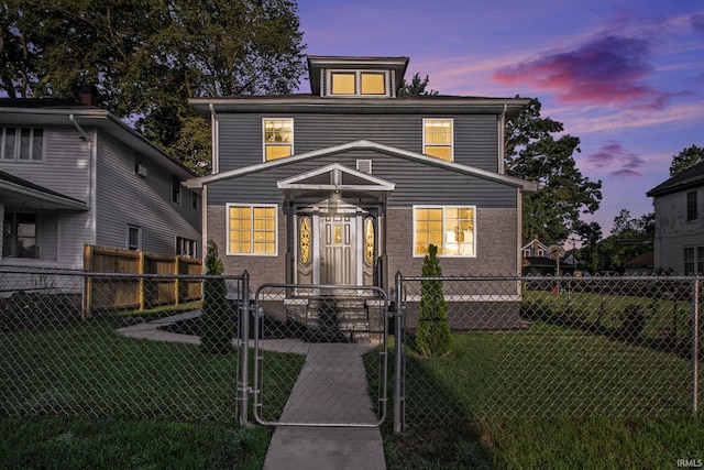 view of front of house with a lawn