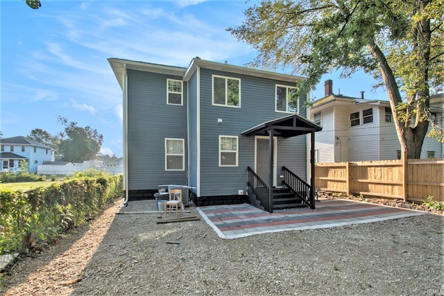 back of house featuring a patio