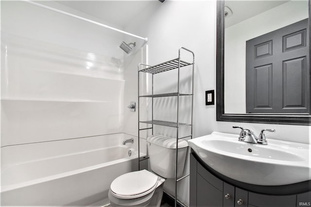 full bathroom with toilet, washtub / shower combination, and vanity