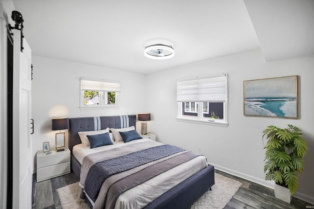 bedroom featuring dark hardwood / wood-style floors