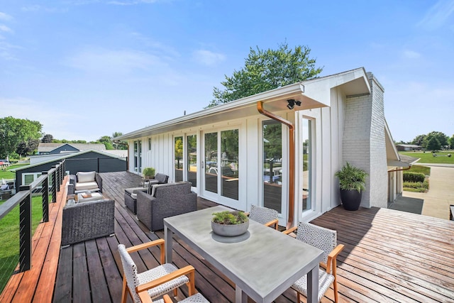 wooden deck with an outdoor hangout area