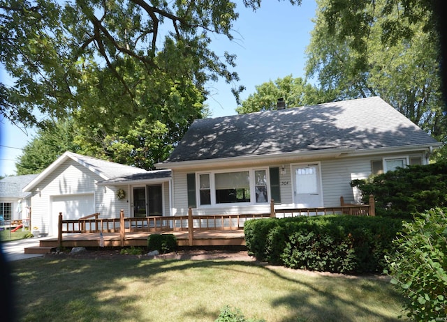 view of front of house with a wooden deck and a front yard