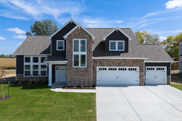 view of front of home featuring board and batten siding, a front yard, concrete driveway, and a shingled roof