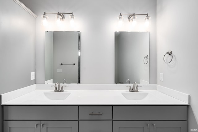 bathroom with double vanity and a sink