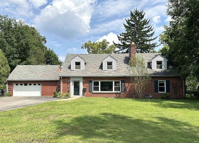 new england style home featuring a garage and a front lawn