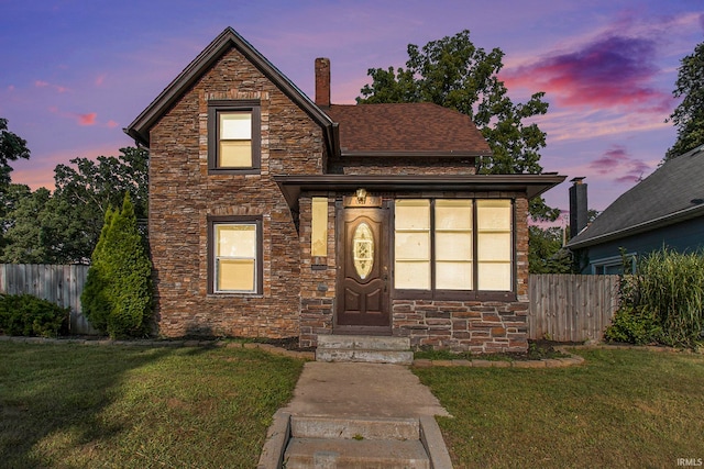 view of property with a lawn