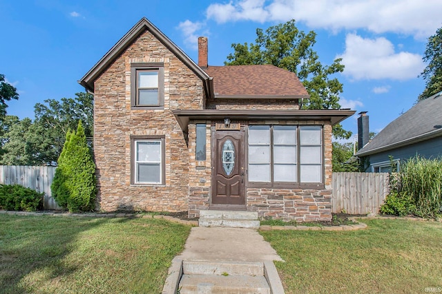 view of front property featuring a front yard