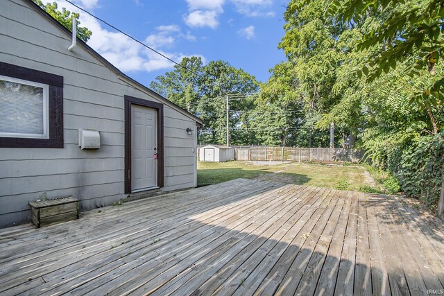 deck featuring a storage shed