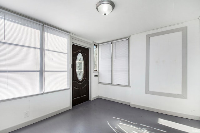 entryway with concrete floors