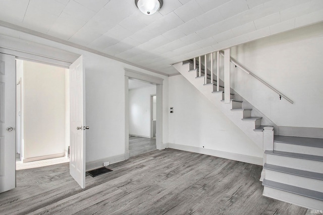 interior space with hardwood / wood-style flooring