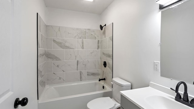 full bathroom with vanity, toilet, and tiled shower / bath combo