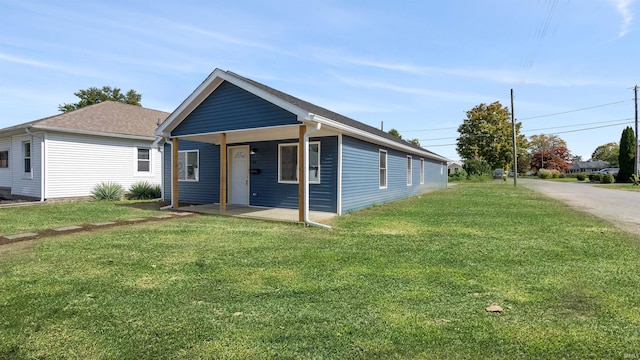 view of front of home with a front lawn