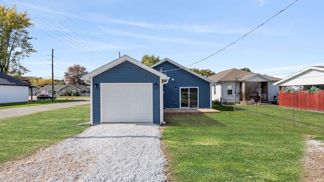 view of front facade featuring a front lawn and a garage