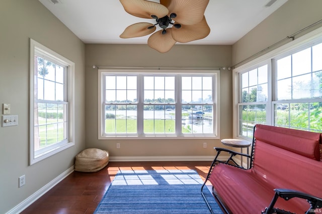 sitting room featuring ceiling fan and hardwood / wood-style flooring