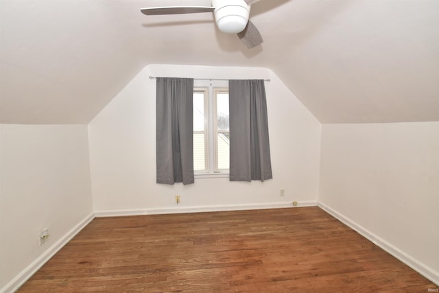 additional living space with ceiling fan, hardwood / wood-style floors, and lofted ceiling