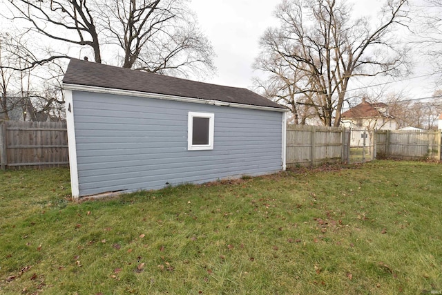 view of outdoor structure with a yard