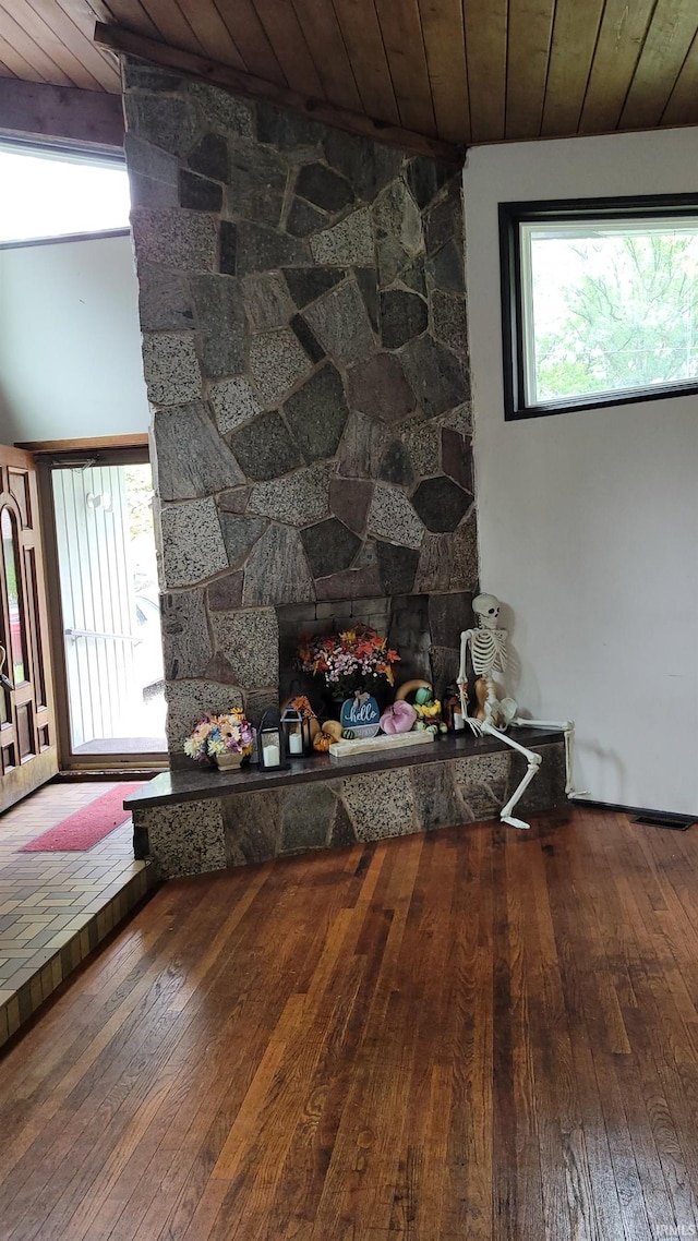 room details featuring wood ceiling and hardwood / wood-style flooring