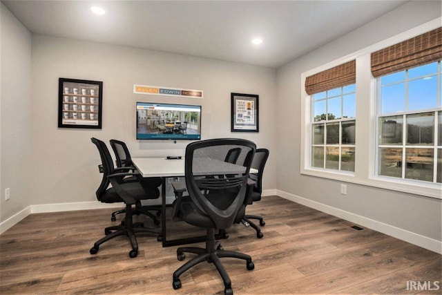 office space with hardwood / wood-style floors