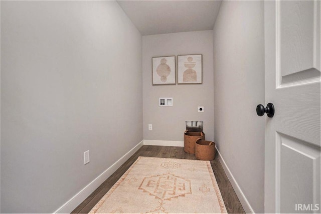 washroom featuring dark hardwood / wood-style flooring, hookup for a washing machine, and hookup for an electric dryer