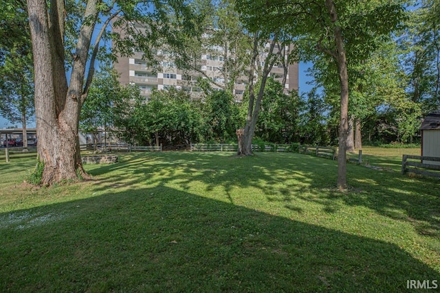 view of yard with fence