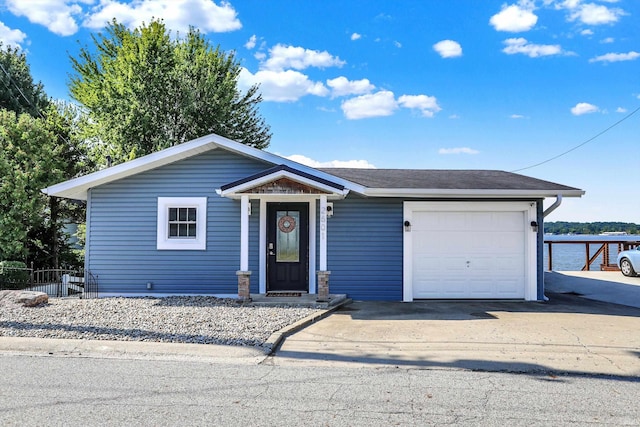 single story home featuring a garage