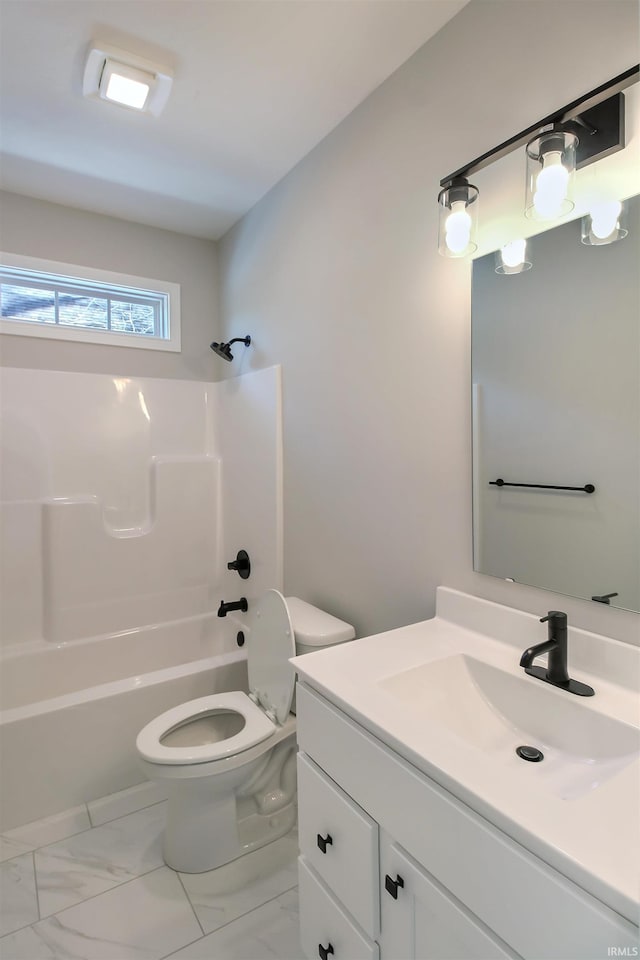 full bathroom featuring vanity, toilet, and tub / shower combination