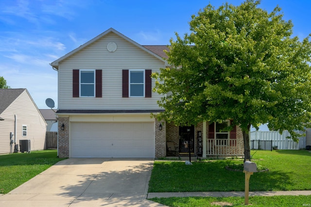 3128 Springwater Ct, Kokomo, IN 46902 - view of front facade with brick siding, a garage, covered porch, and driveway