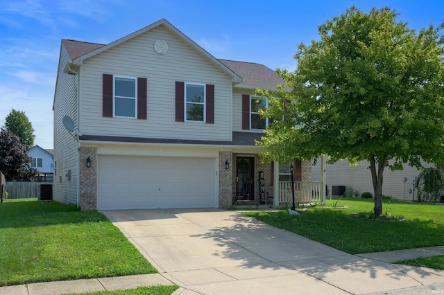 3128 Springwater Ct, Kokomo, IN 46902 - traditional-style home with an attached garage, brick siding, a front yard, covered porch, and concrete driveway
